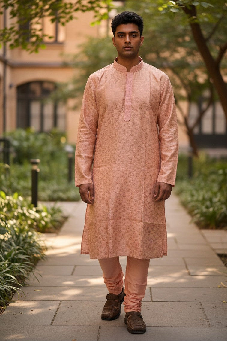 Panache By Divya peach-pink kurta pajama set with subtle all-over pattern and pink collar detail.